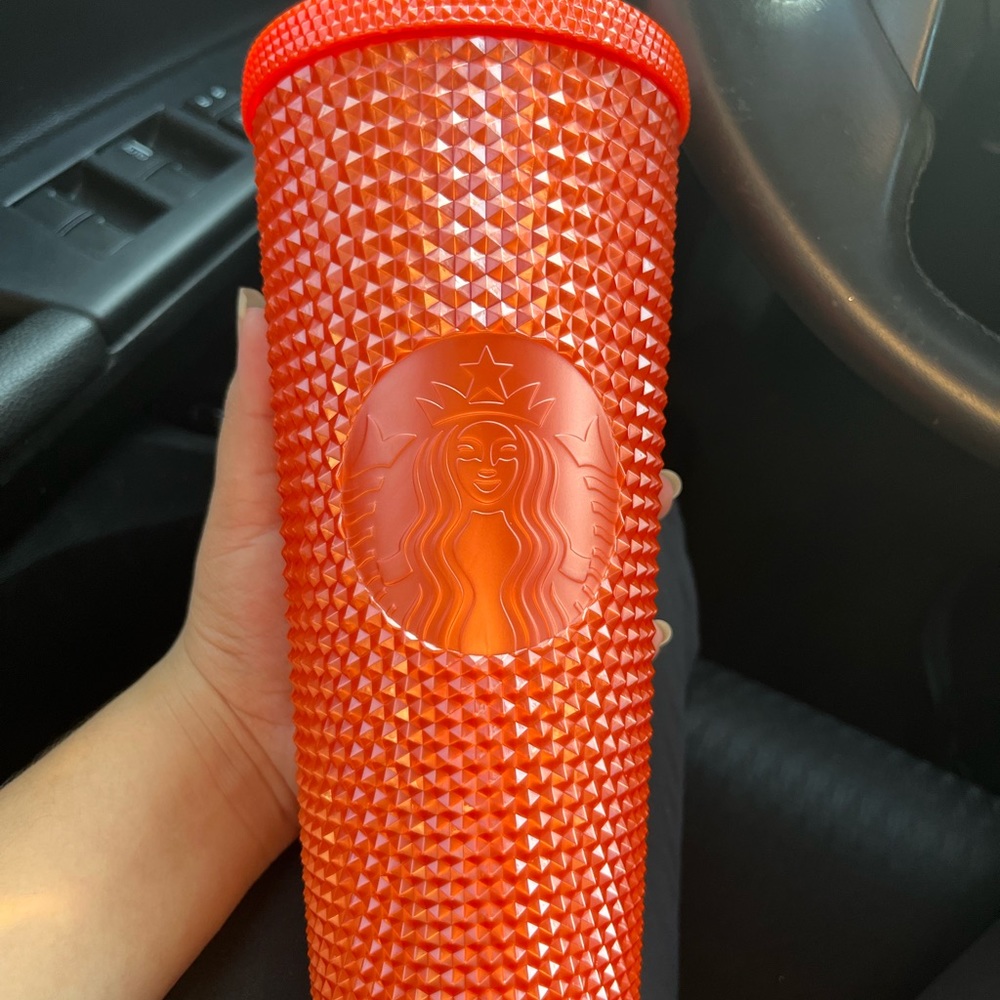 Orange bling studded Starbucks tumbler